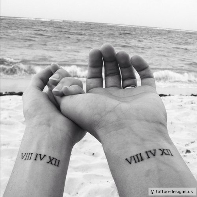 Lovely Matching Roman Numerals Tattoos On Wrists