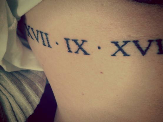 Lovely  Roman Numerals Tattoo On Side Rib