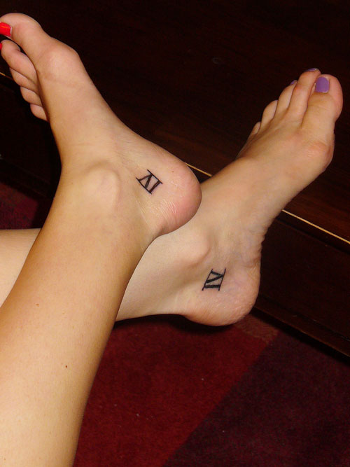 Matching Roman Numeral Four Tattoo On Both Foots