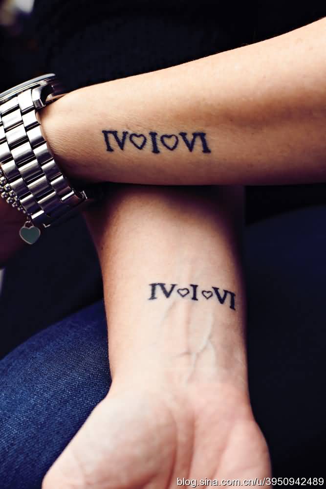 Matching Roman Numeral With Heart Tattoo On Wrist