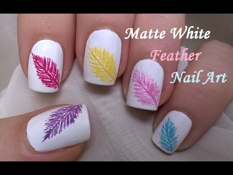 Matte White Nails With Multicolored Feather Nail Art