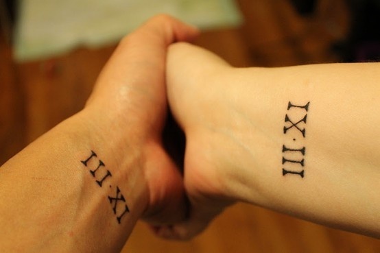 Nice Illusion Roman Numeral Tattoo On Wrist