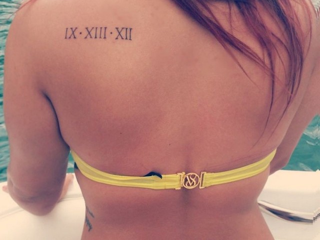 Nice Roman Numeral Date Tattoo On Left Upper Shoulder