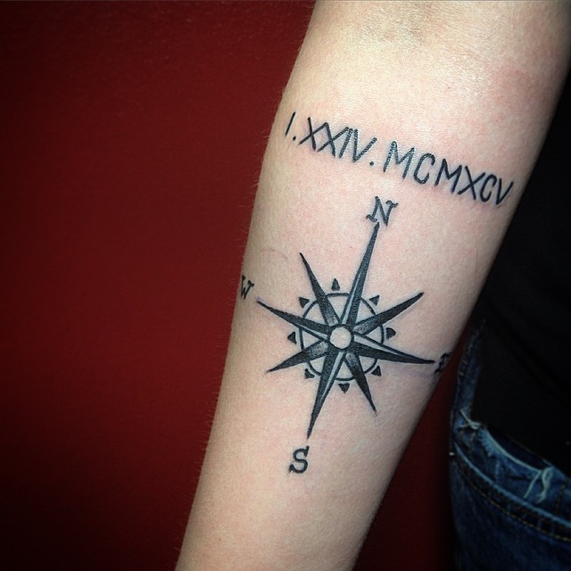 Nice Roman Numeral With Compass Tattoo On Forearm