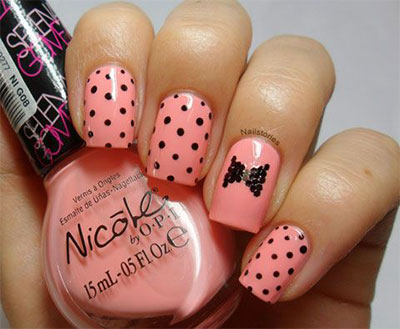 Peach Nails With Black Polka Dots And Accent Bow Design Nail Art