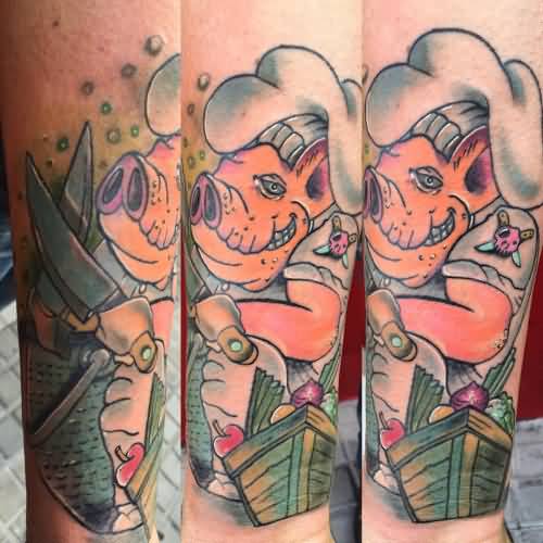 Pig Chef With Knives And Vegetables Tattoo On Forearm