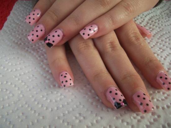 Pink Base Nails With Black Polka Dots Nail Art And Bows Design