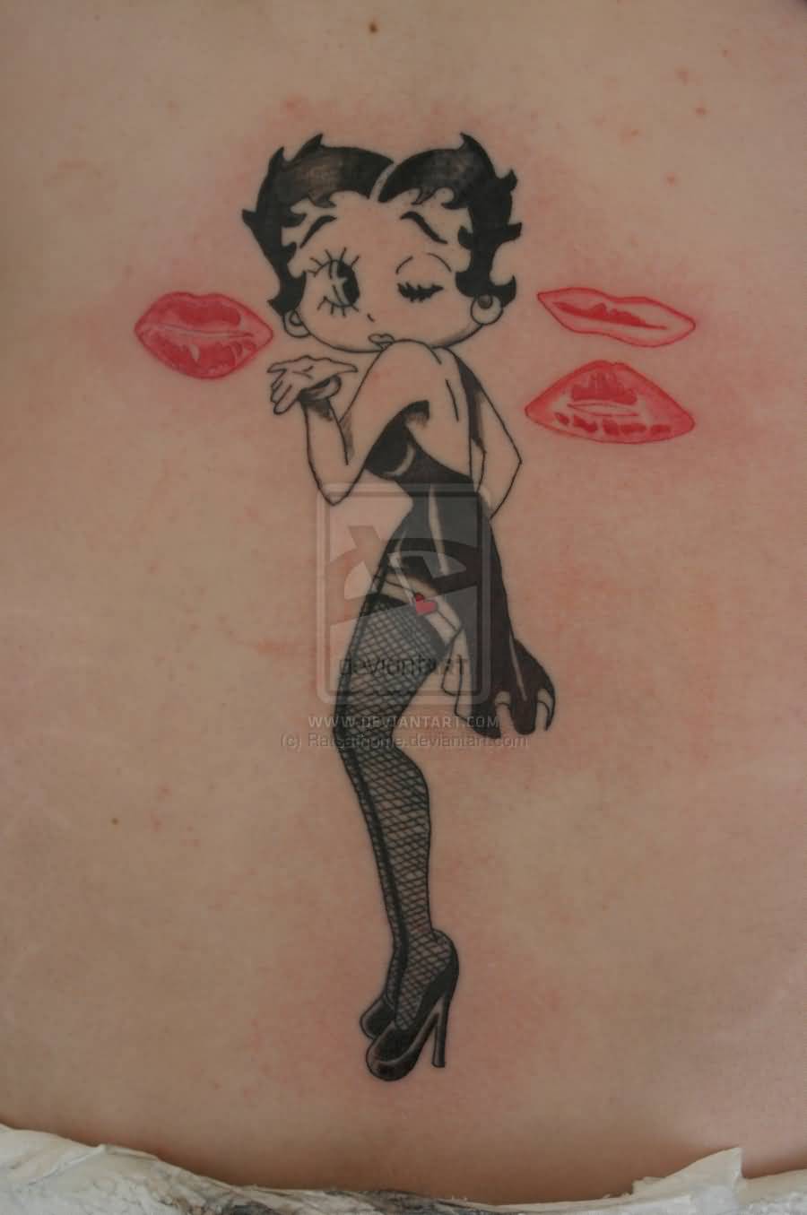 Pink Lip Prints And Betty Boop Tattoo On Upper Back