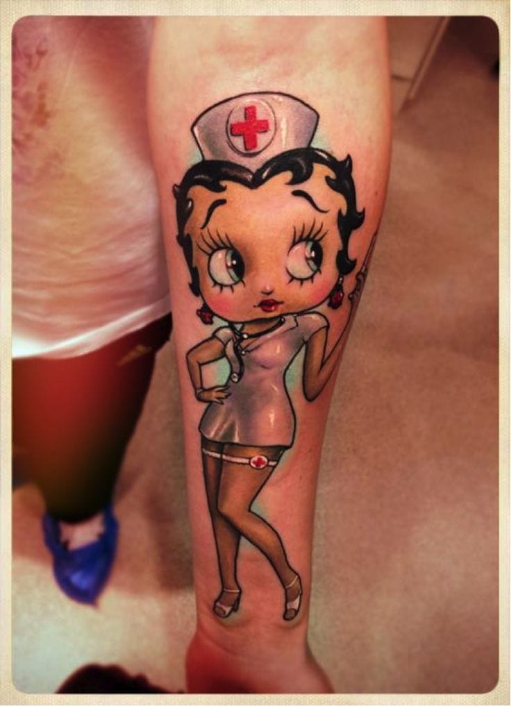 Pinup Nurse Betty Boop Tattoo On Forearm
