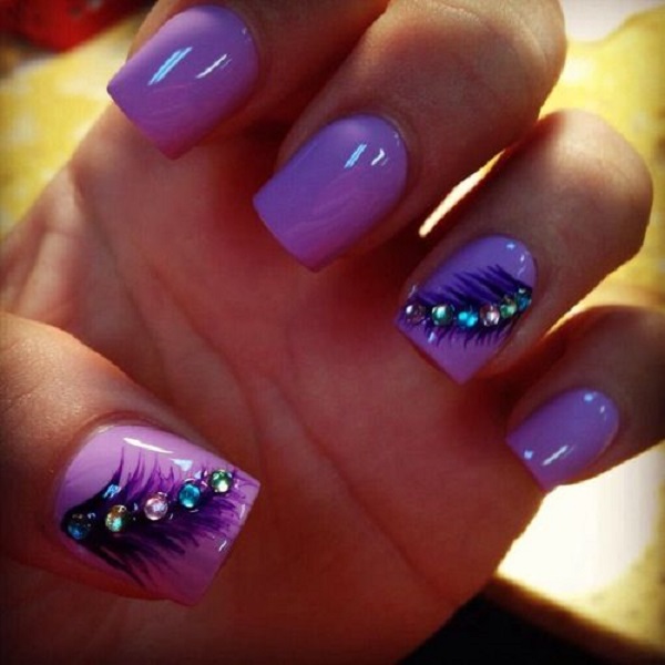 Purple Glossy Nails With Feather Nail Art And Rhinestones Design