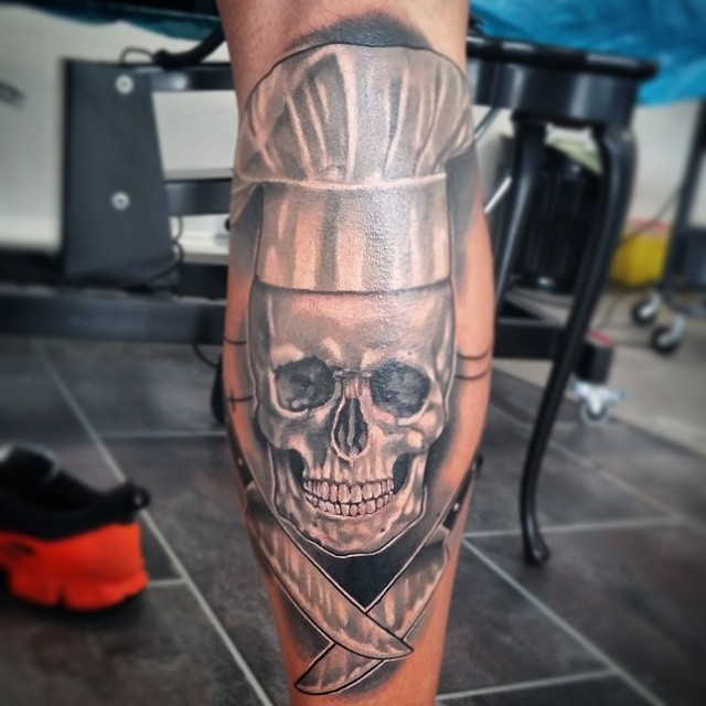 Realistic Chef Skull With Crossed Knives Tattoo On Forearm