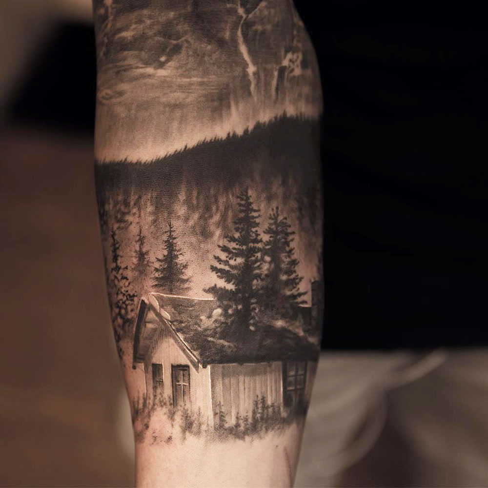 Realistic Forest House Tattoo On Forearm by Niki Norberg