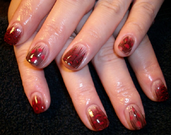 Red Feather Nail Art With Polka Dots Design