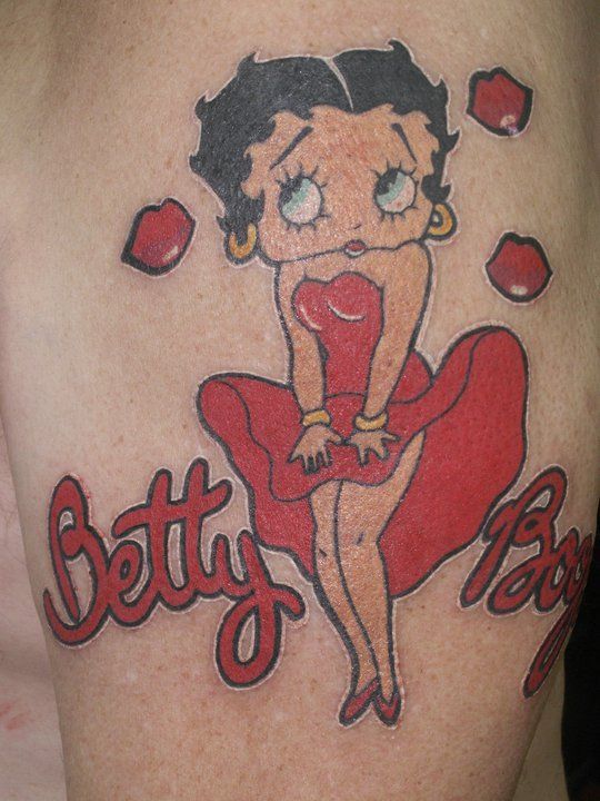 Red Ink Betty Boop Tattoo On Left Shoulder
