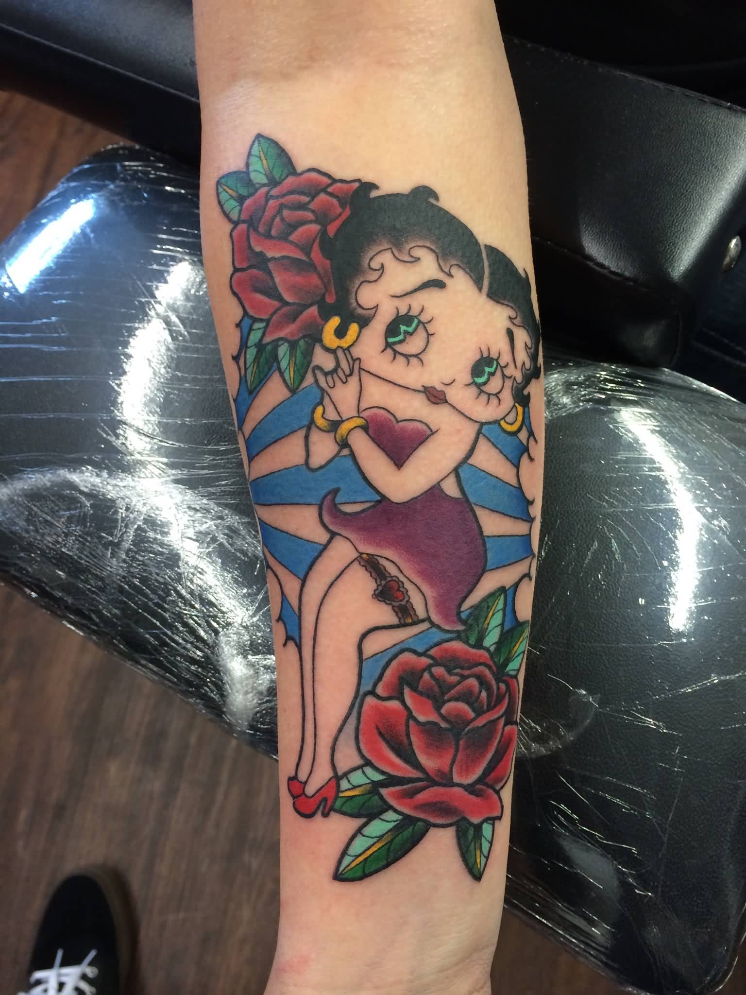 Red Roses And Betty Boop Tattoo On Right Forearm