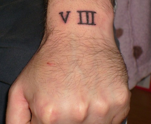 Roman Numeral Eight Tattoo On Wrist