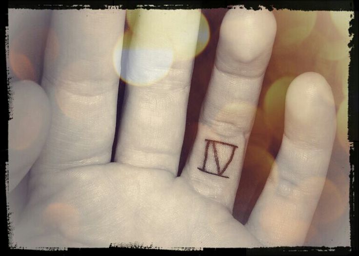 Roman Numeral Four Tattoo On Finger
