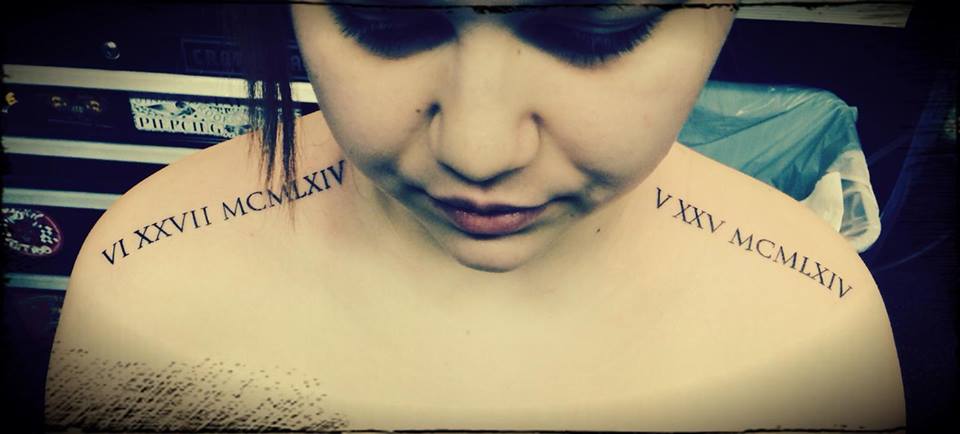 Roman Numerals Tattoo On Both Shoulders