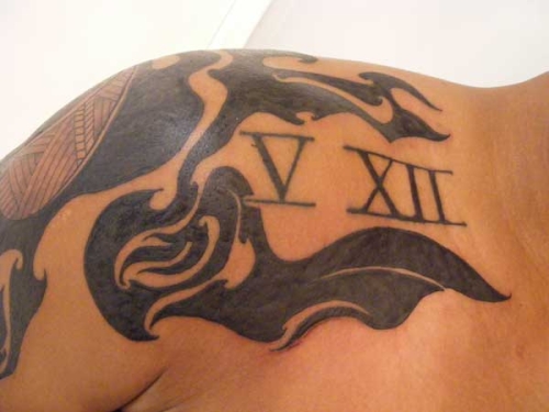 Roman Numerals With Tribal Design Tattoo On Right Shoulder