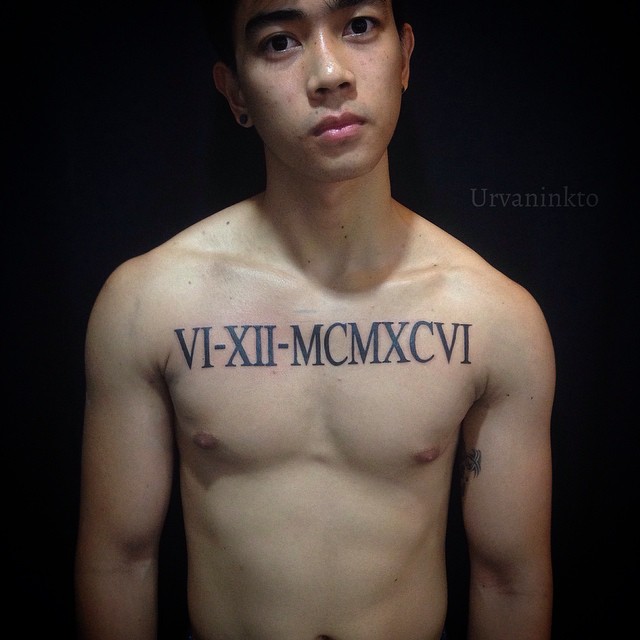 Simple Roman Numeral Chest Tattoo For Men