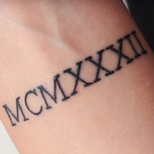 Simple Roman Numeral Tattoo On Wrist