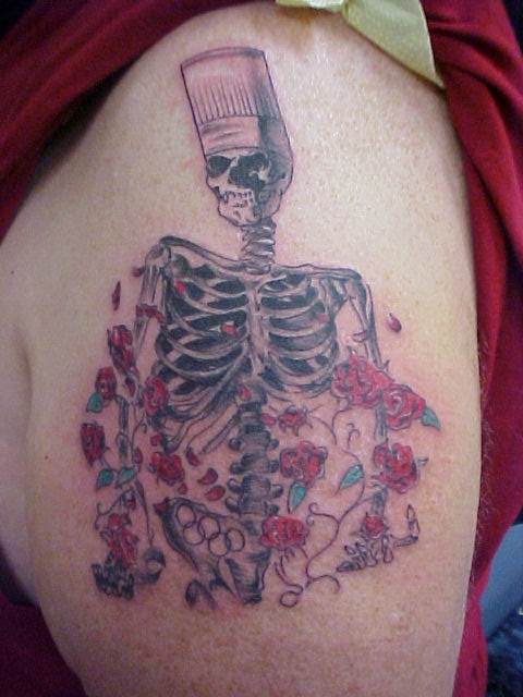 Skeleton Chef With Red Flowers Tattoo On Half Sleeve By LioNel