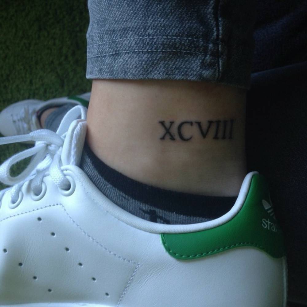 Small Nice Roman Numerals Tattoo On Ankle