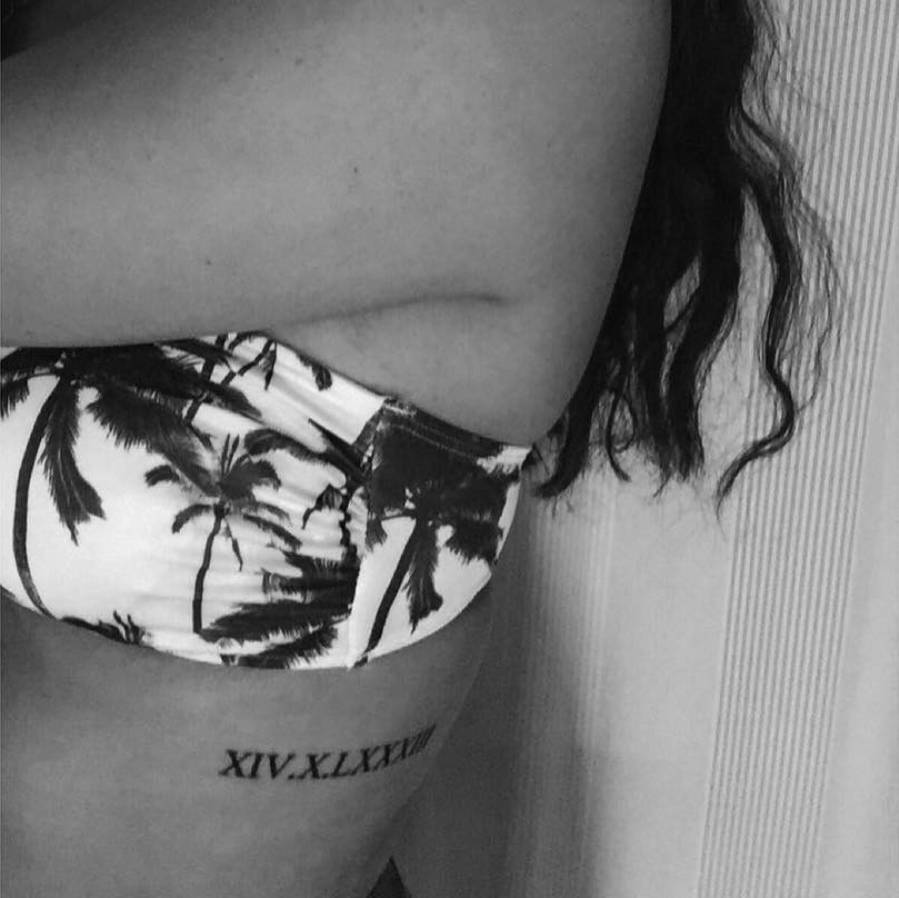 Small Roman Numeral Tattoo On Side Rib For Girl