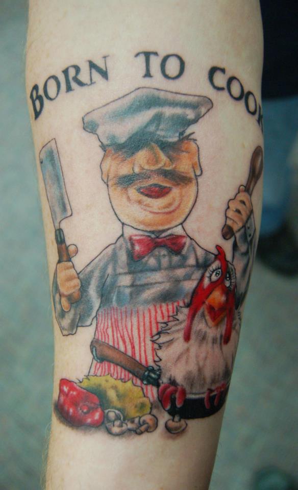 Swedish Chef With Chicken And Born To Fight Letters Tattoo On Forearm