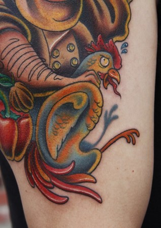 Tattoo Holding Scared Chicken Tattoo