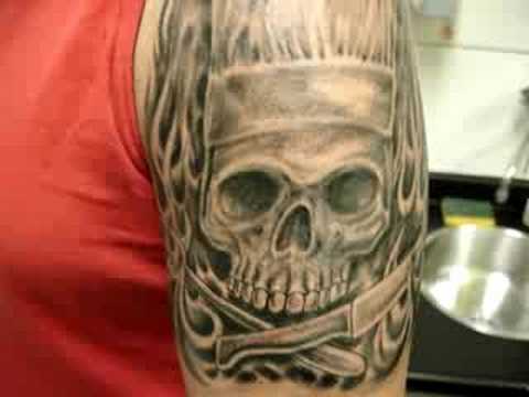 Terrific Chef Skull With Knives And Flames Tattoo On Half Sleeve