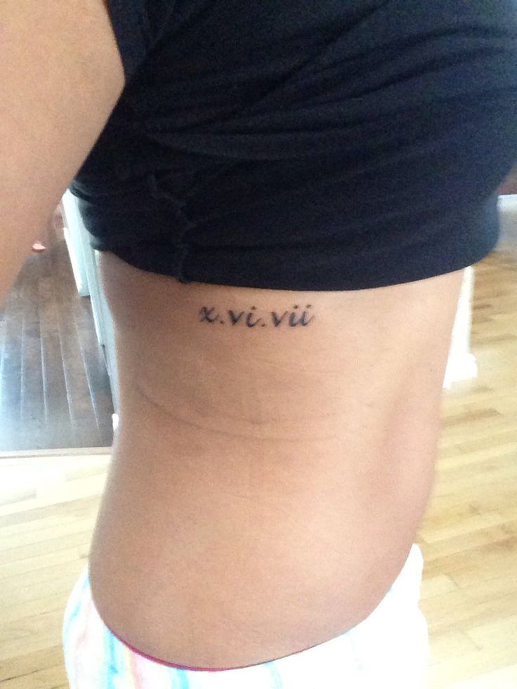 Tiny And Cute Roman Numeral Tattoo On Side Rib