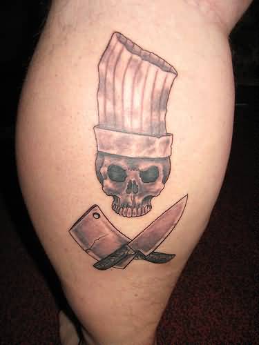 Tiny Chef Skull And Knife And Cleaver Tattoo