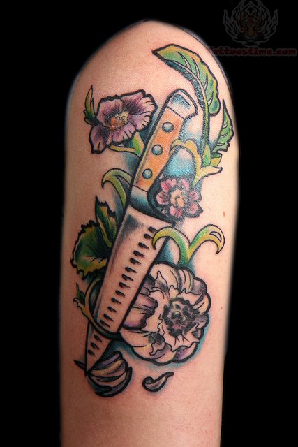 Traditional Chef Knife With Purple Flowers And Garlic Tattoo On Half Sleeve
