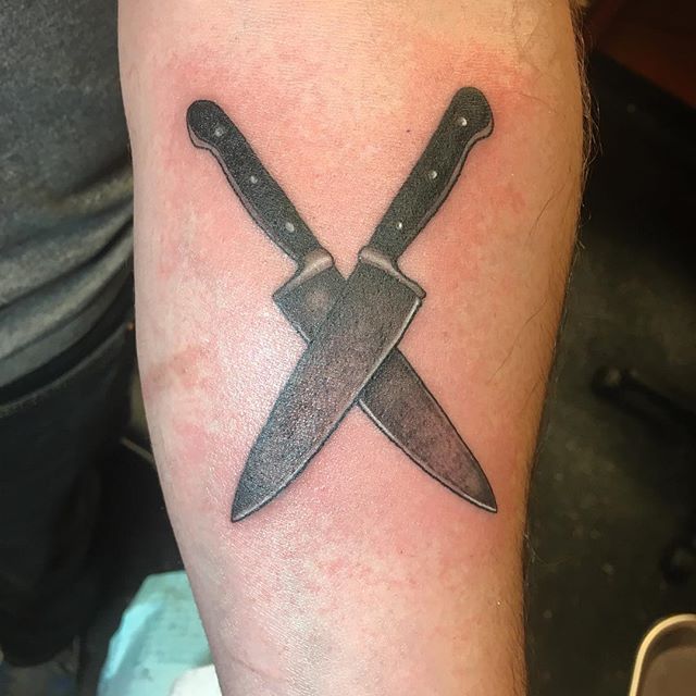Two Crossed Chef Knives Tattoo On Forearm
