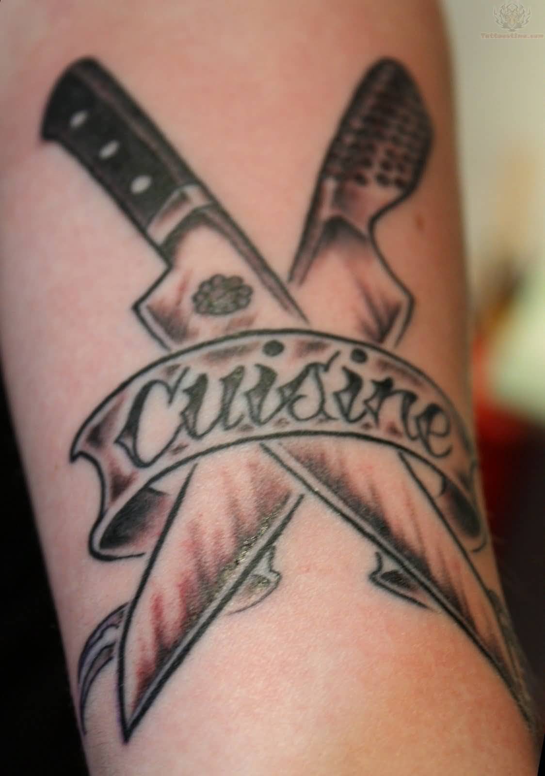 Two Crossed Knives With Cuisine On Banner Chef Tattoo On Arm Sleeve