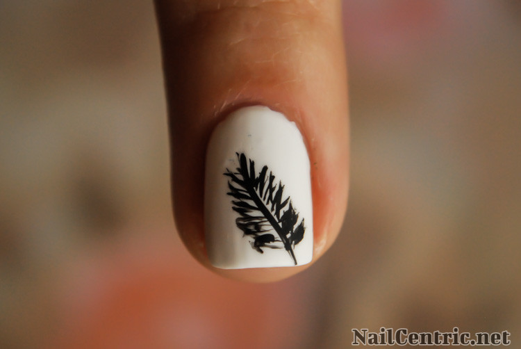 White Nails With Black Feather Nail Design