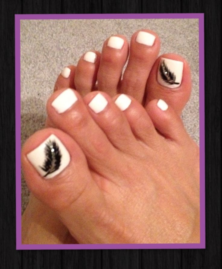 White Nails With Black Feather Toe Nail Art