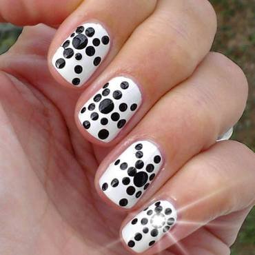 White Nails With Black Polka Dot Nail Art Design
