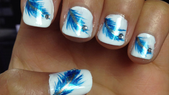 White Short Nails With Blue Feather Nail Art