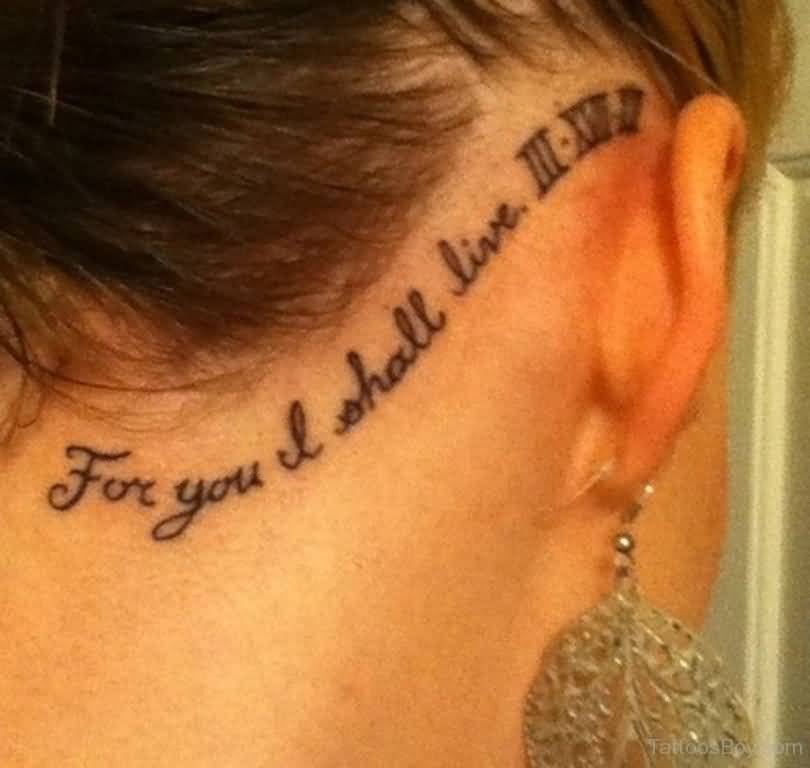 Wording With Roman Numeral Tattoo On Behind The Ear