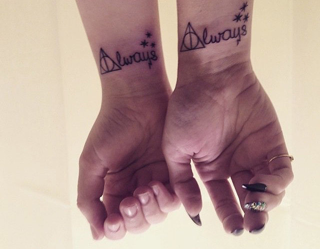 A In Triangle Shape With Lways Matching Tattoo On Wrists