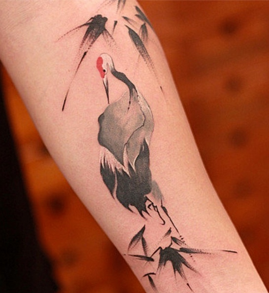 Abstract Crane Tattoo On Forearm