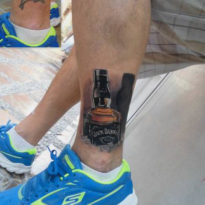 Amazing 3D Jack Daniels Ripped Skin Tattoo On Ankle