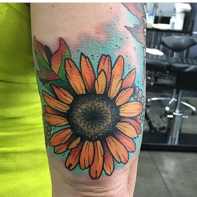 Amazing Flower Tattoo On Left Bicep by Chad Lambert