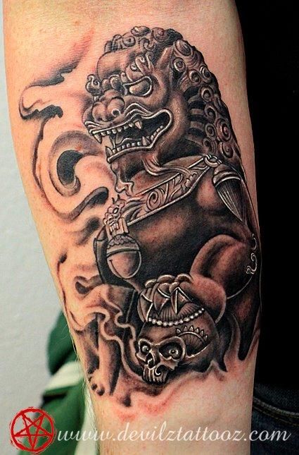 Amazing Grey Chinese Foo Dog With Skull Tattoo