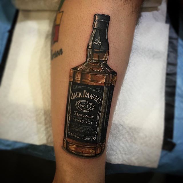 Amazing Jack Daniel Bottle Tattoo On Arm Sleeve