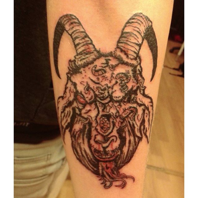 Angry Slipknot Goat Head Tattoo On Triceps