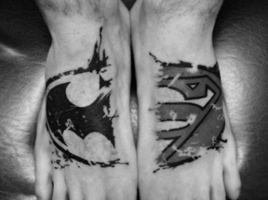 Batman And Superman Logo Matching Tattoos On Both Foots