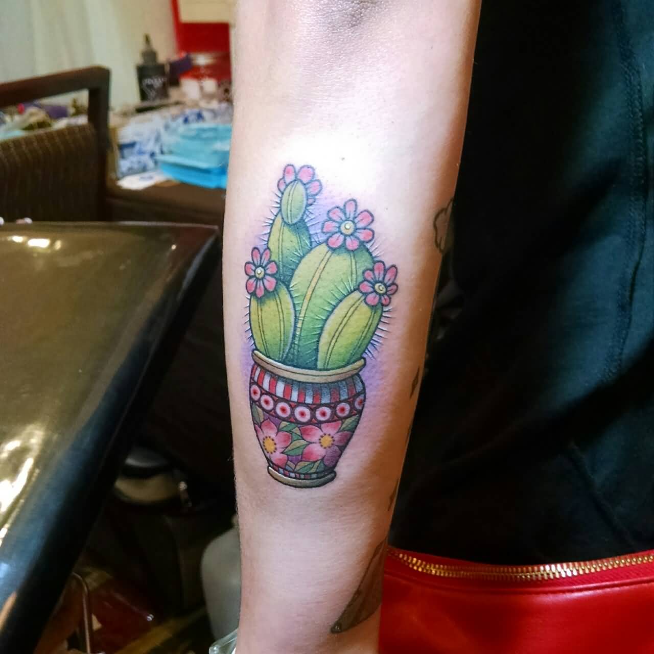 Beautiful Cactus In Pot Traditional Tattoo On Arm Sleeve